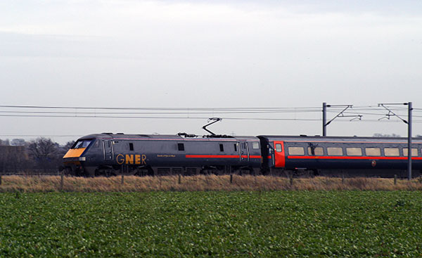 GNER class 91 locomotive and mk4 coaches heading north nr Bathley